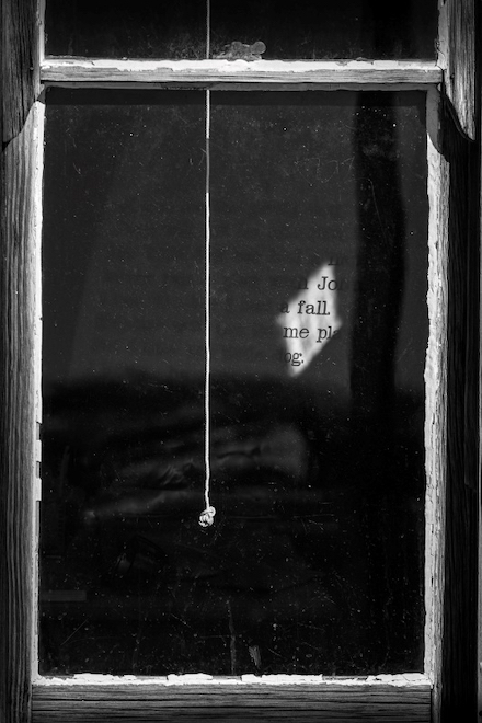 Bodie ghost town window: Photograph © by Chuck Kimmerle