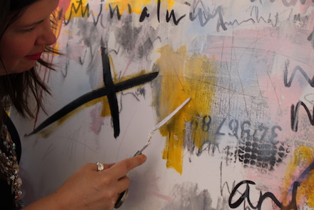 Lorette C. Luzajic at work on a painting, 2019