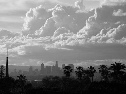 Clouds and Downtown Los Angeles Skyline: B&W photograph by Jonathan Yungkans